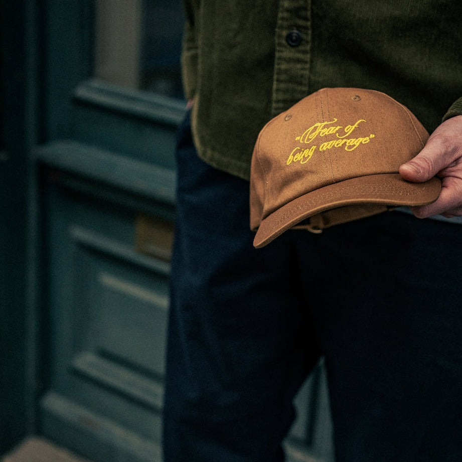 Stand Out with the "Fear of Being Average" Cap – Stylish and Bold